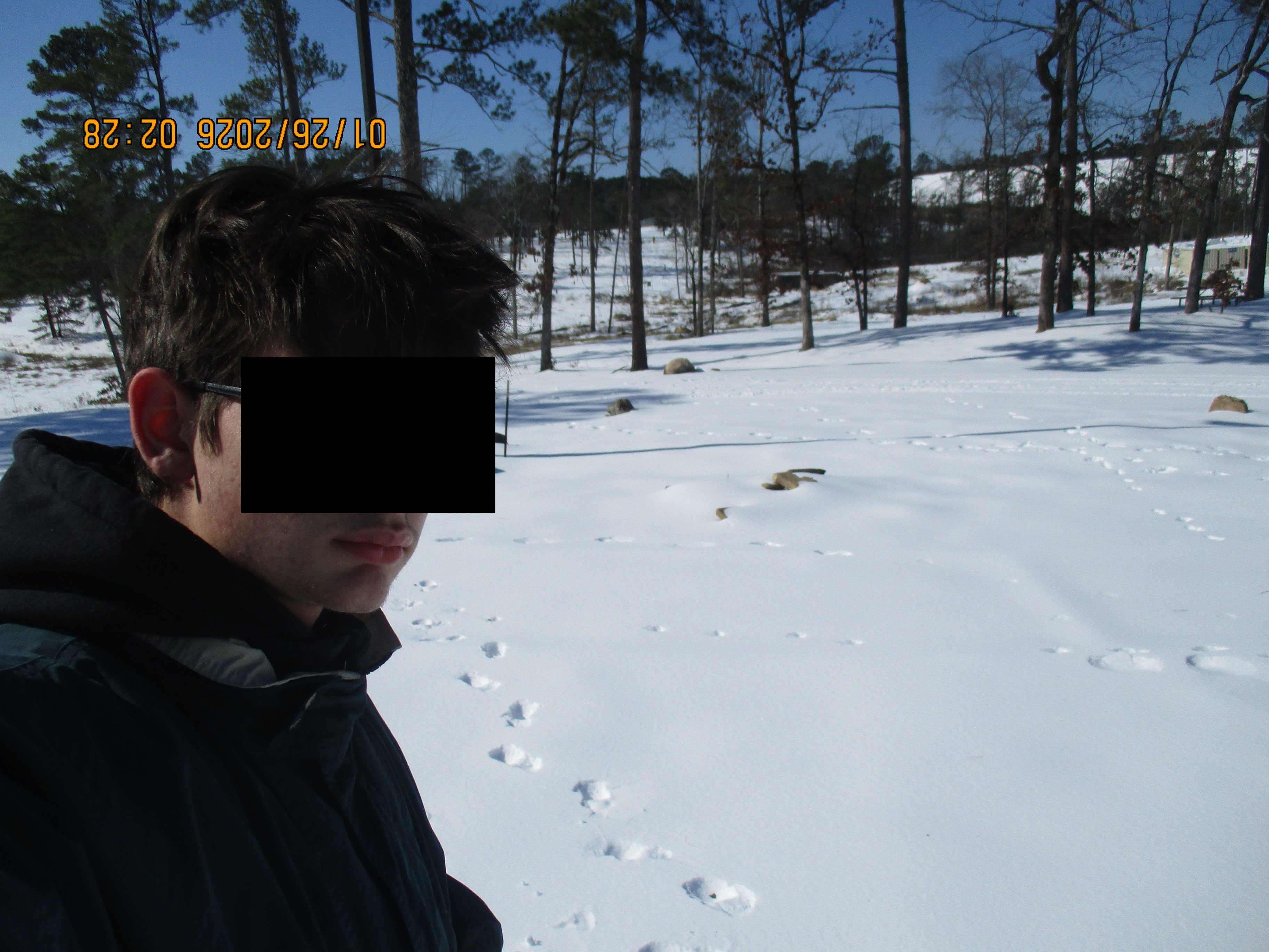 Me in the snow before sledding with a friend